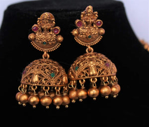 Mesmerizing South Temple jewellery long necklace set with jhumka - Gemzlane