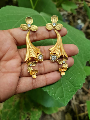 Gemzlane matt golden Danglers  earrings .