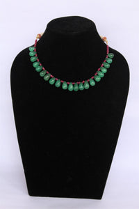 Precious ruby and emerald drops stone necklace with traditional Indian thread