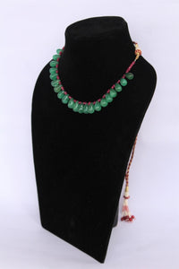 Precious ruby and emerald drops stone necklace with traditional Indian thread